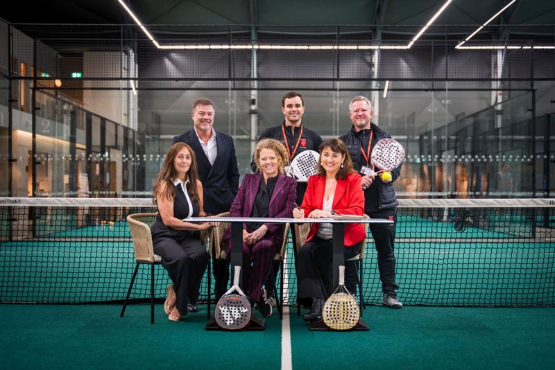 The New Hall School and Beaulieu Padel Club teams at the sponsorship signing, on court